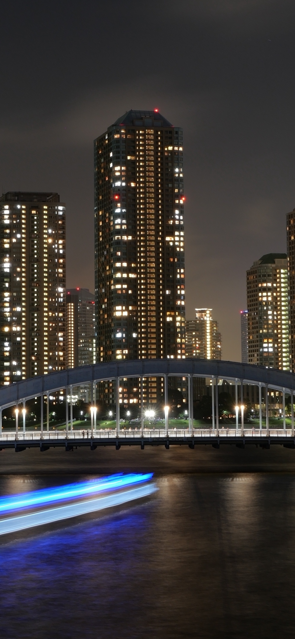 City Skyline During Night Time. Wallpaper in 1242x2688 Resolution