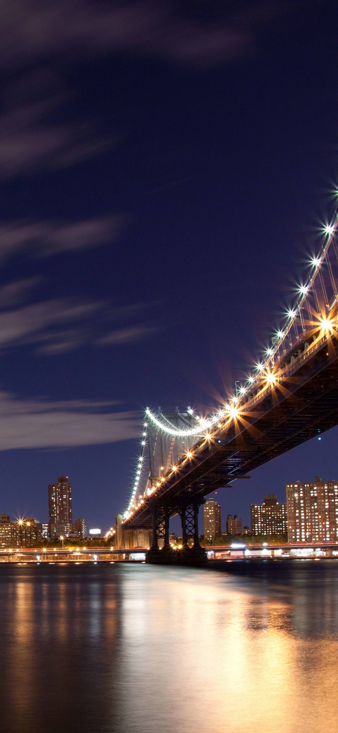 Horizonte de la Ciudad Durante la Noche. Wallpaper in 1125x2436 Resolution