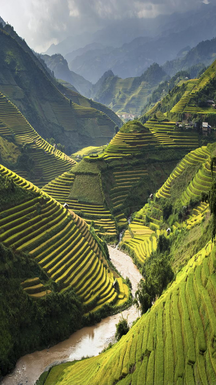 Green Mountains and River During Daytime. Wallpaper in 750x1334 Resolution