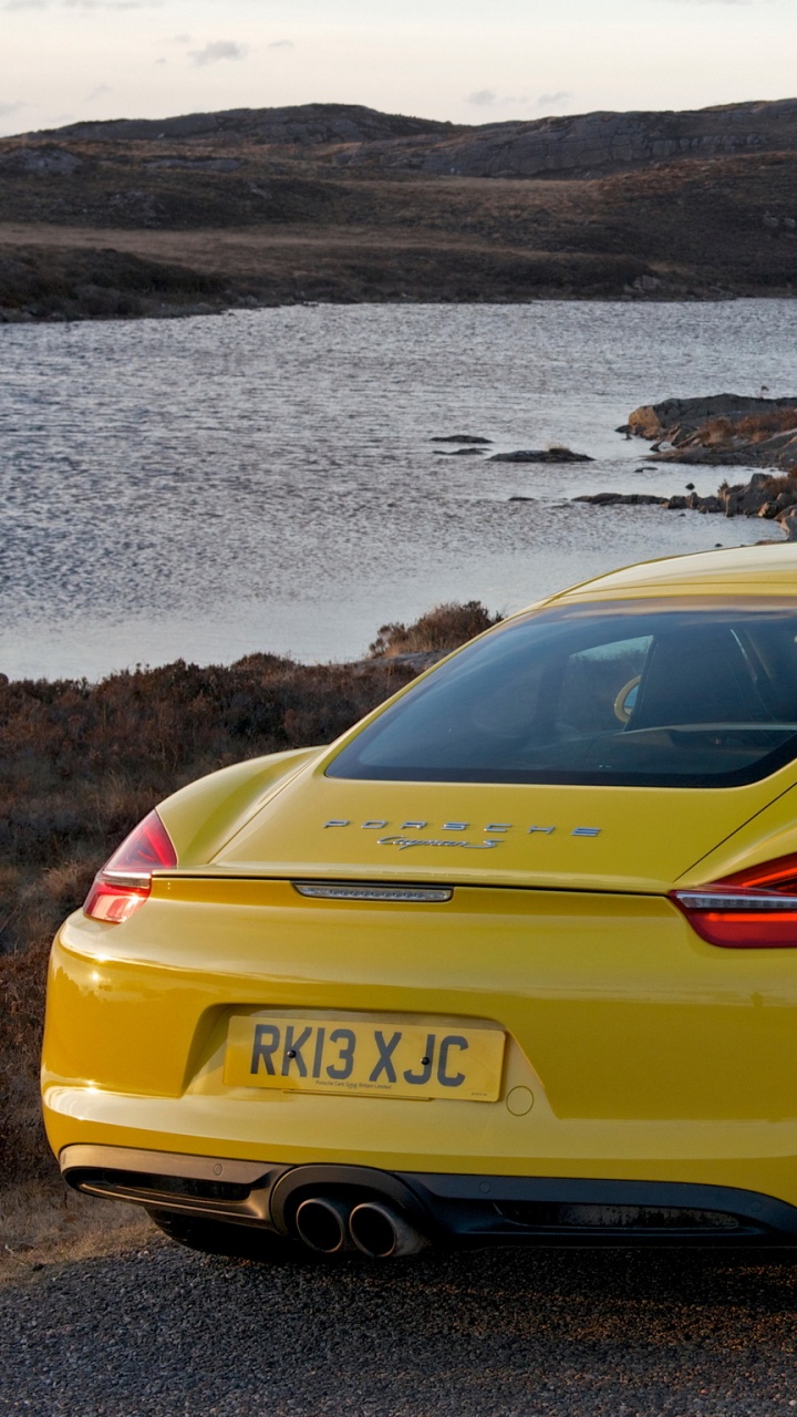 Yellow Porsche 911 on Brown Field During Daytime. Wallpaper in 720x1280 Resolution