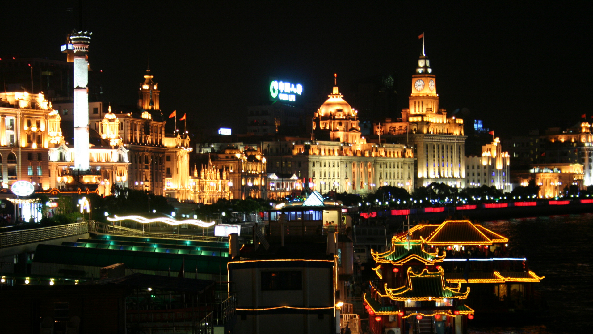 White and Brown Concrete Building During Night Time. Wallpaper in 1920x1080 Resolution