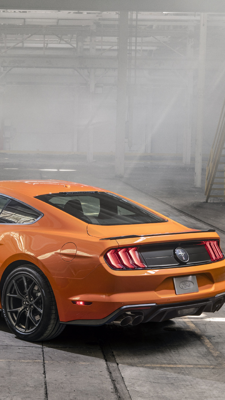 Orange Porsche 911 Parked in Garage. Wallpaper in 750x1334 Resolution