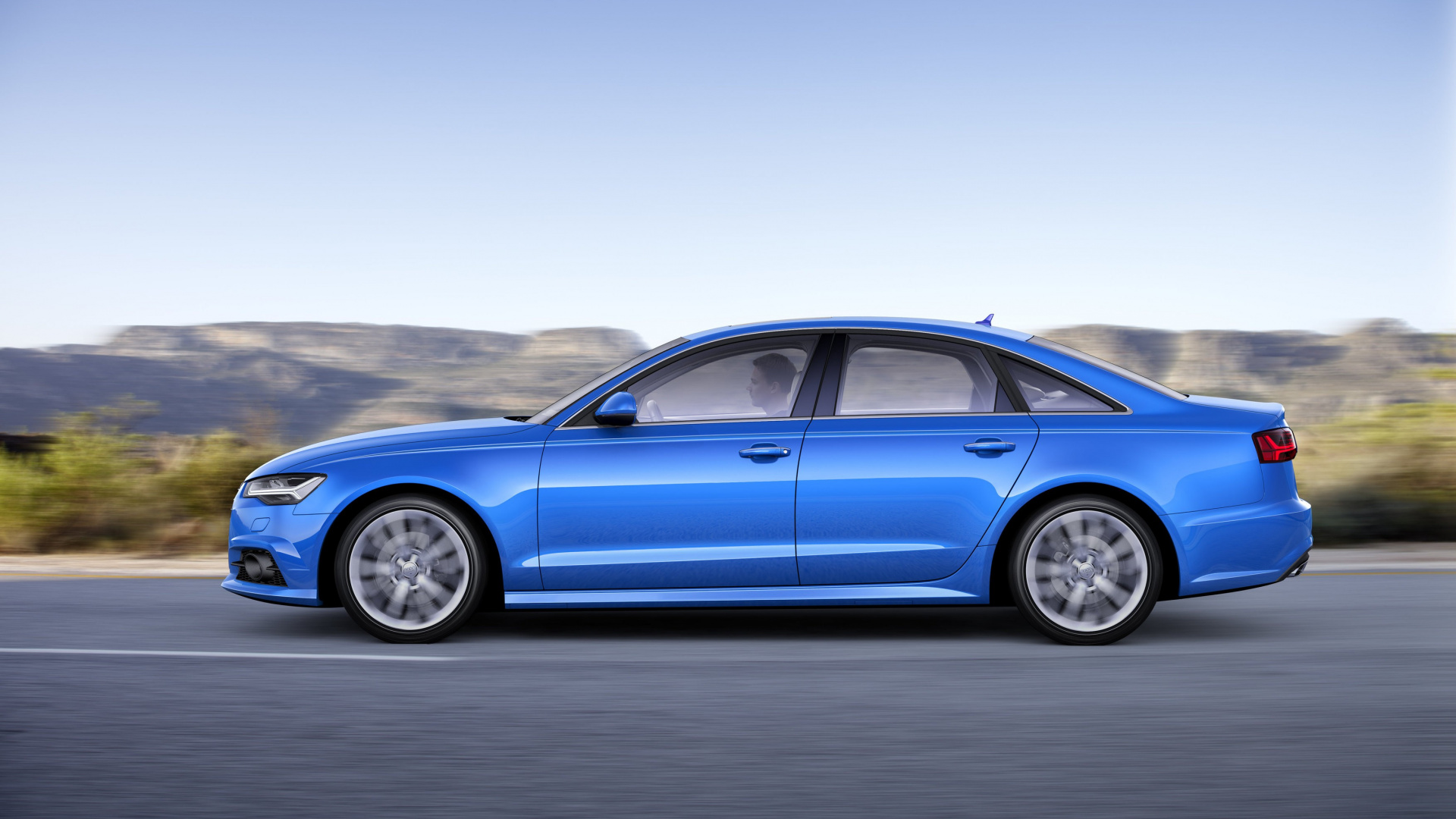 Blue Sedan on Gray Asphalt Road. Wallpaper in 1920x1080 Resolution