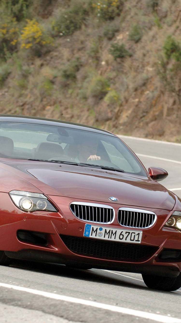 Red Audi Coupe on Road During Daytime. Wallpaper in 750x1334 Resolution