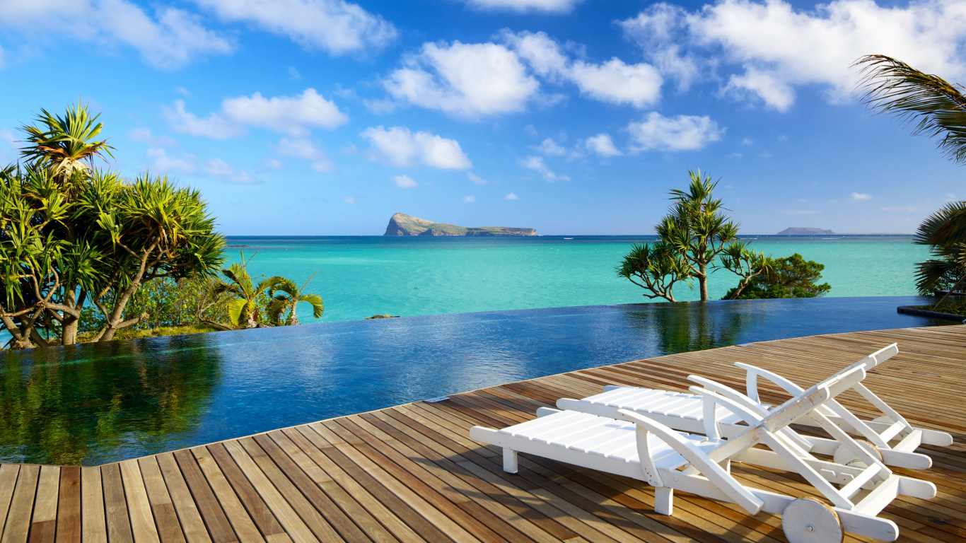 White Wooden Lounge Chairs on Brown Wooden Dock Near Body of Water During Daytime. Wallpaper in 1366x768 Resolution