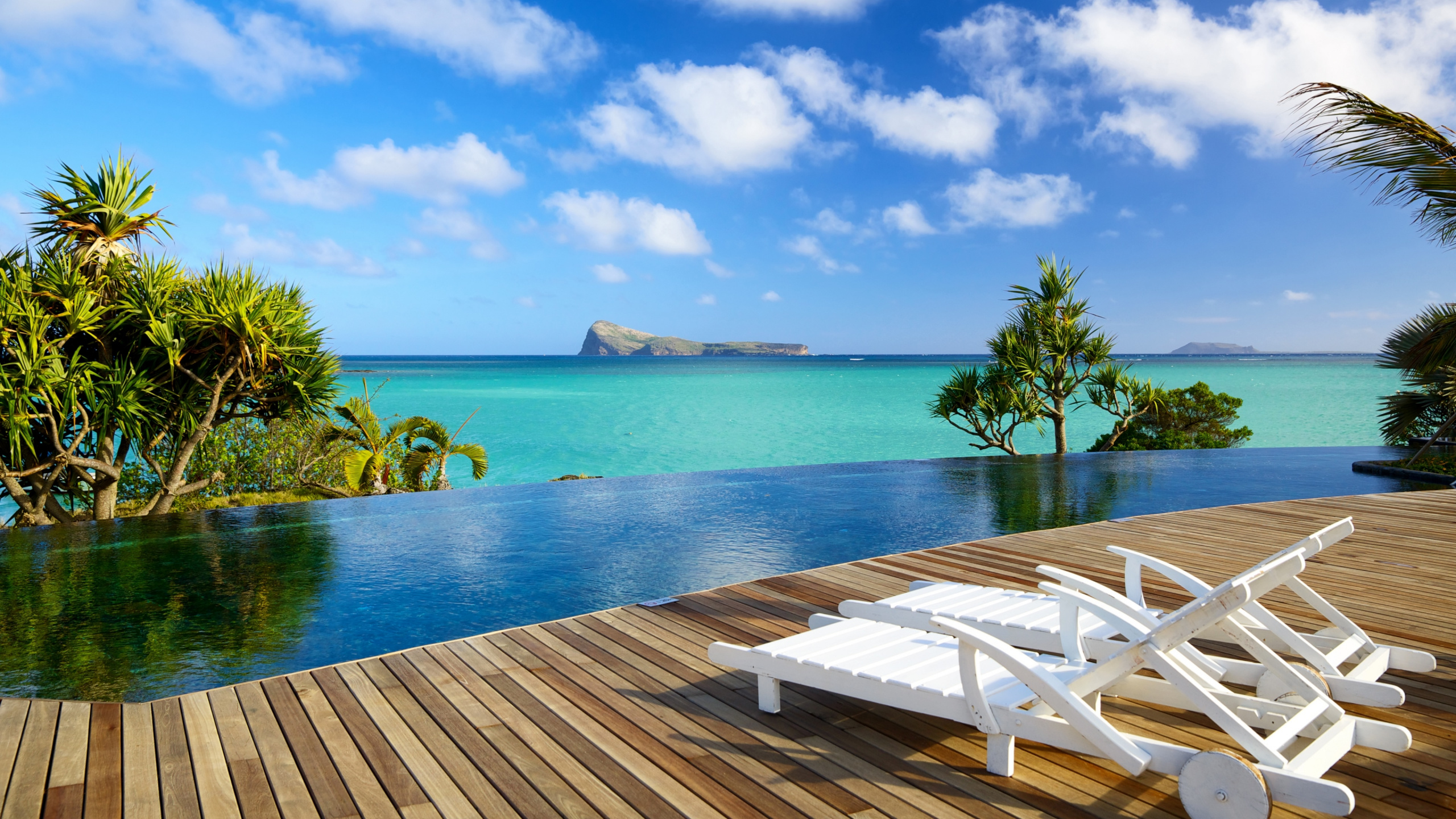 White Wooden Lounge Chairs on Brown Wooden Dock Near Body of Water During Daytime. Wallpaper in 2560x1440 Resolution