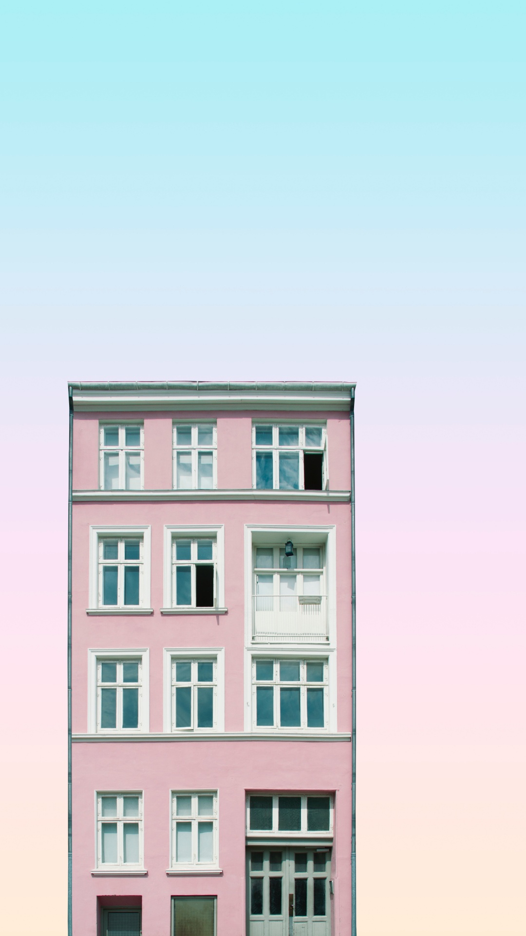 Pink Concrete Building Under White Sky During Daytime. Wallpaper in 1080x1920 Resolution