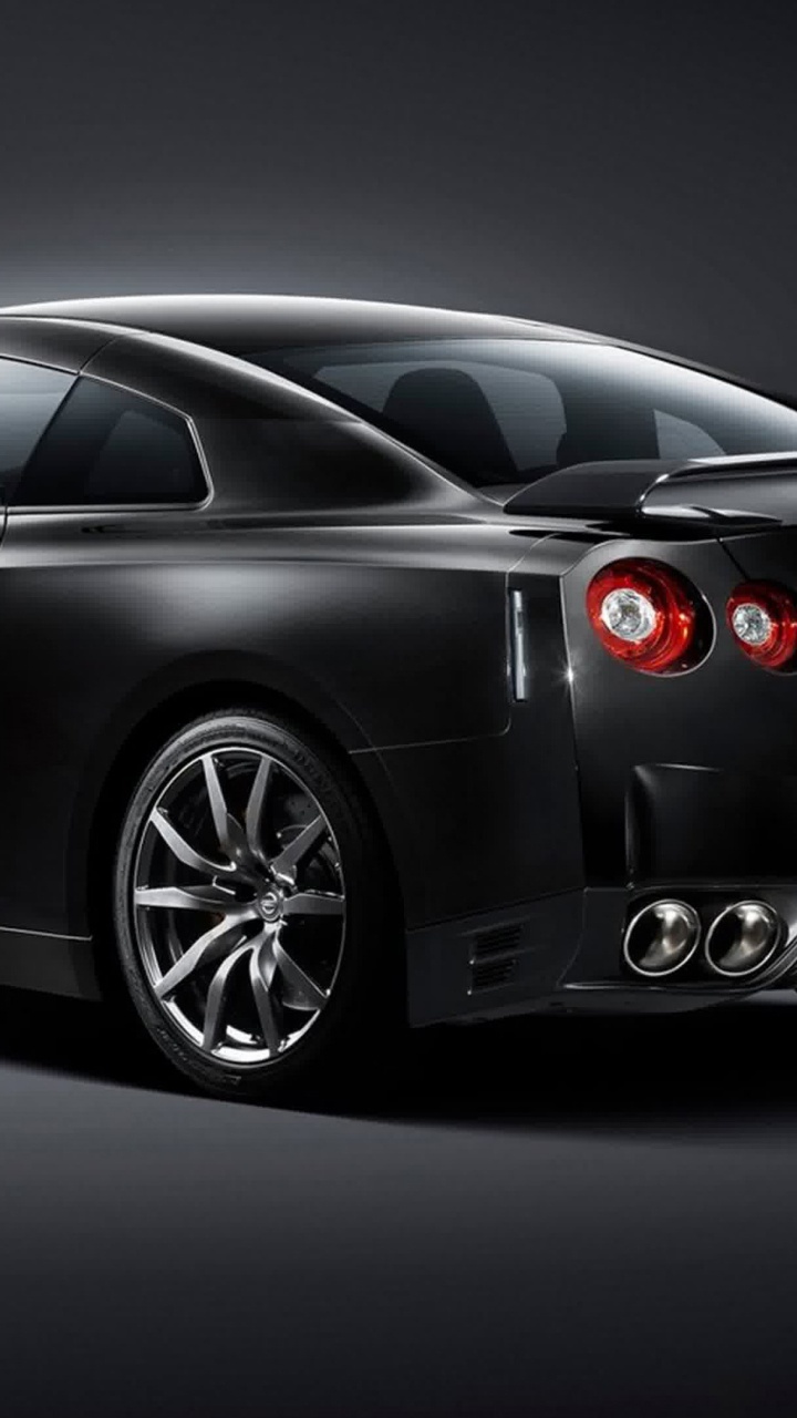 Schwarzer Porsche 911 Auf Schwarzem Hintergrund. Wallpaper in 720x1280 Resolution