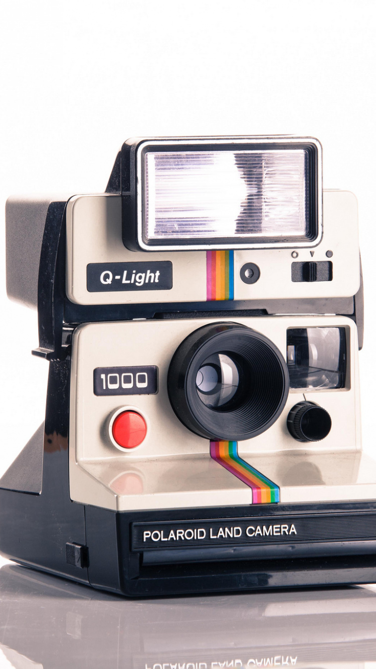 Black and White Polaroid Instant Camera. Wallpaper in 750x1334 Resolution