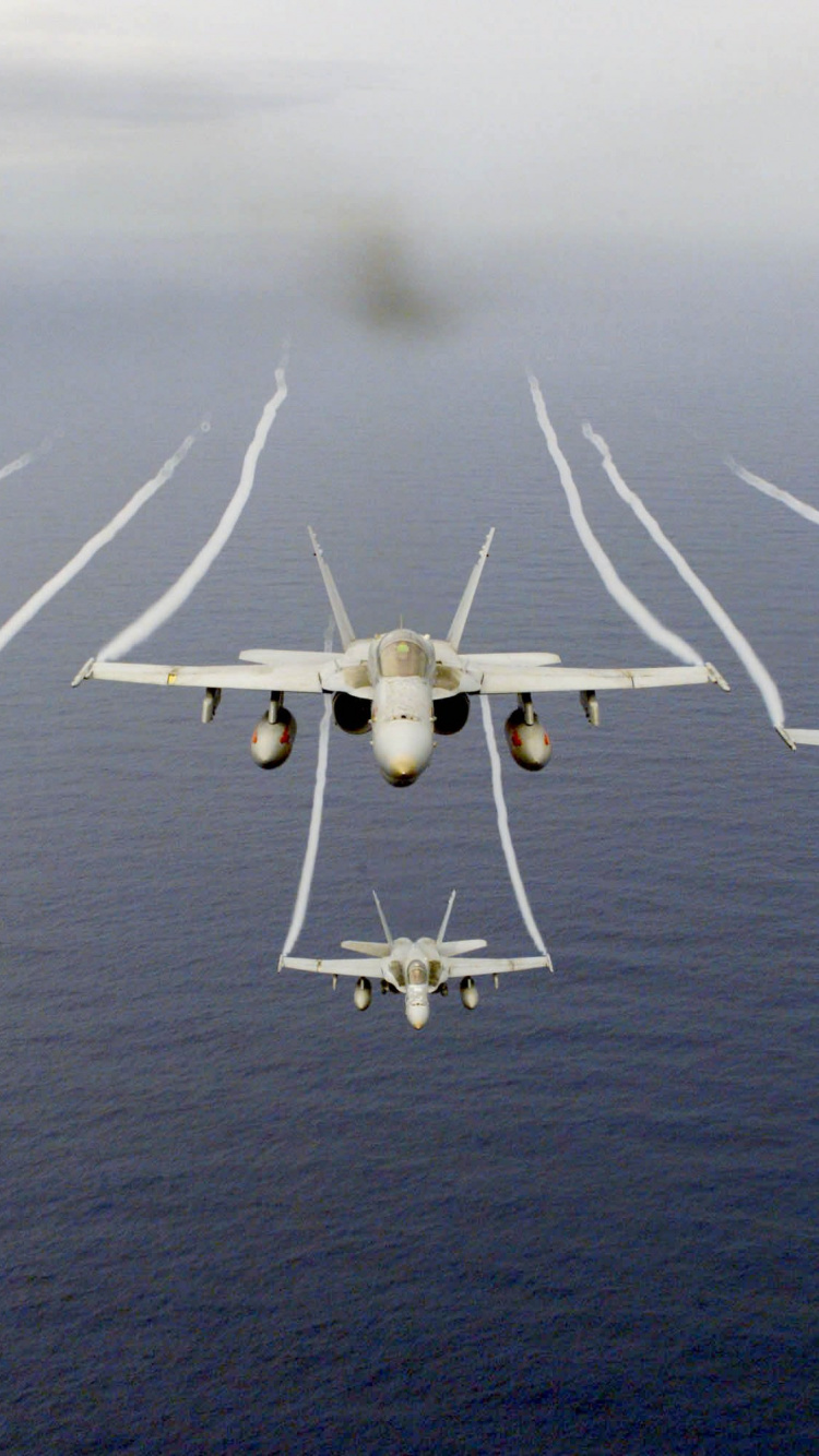 White Jet Plane on Mid Air During Daytime. Wallpaper in 750x1334 Resolution