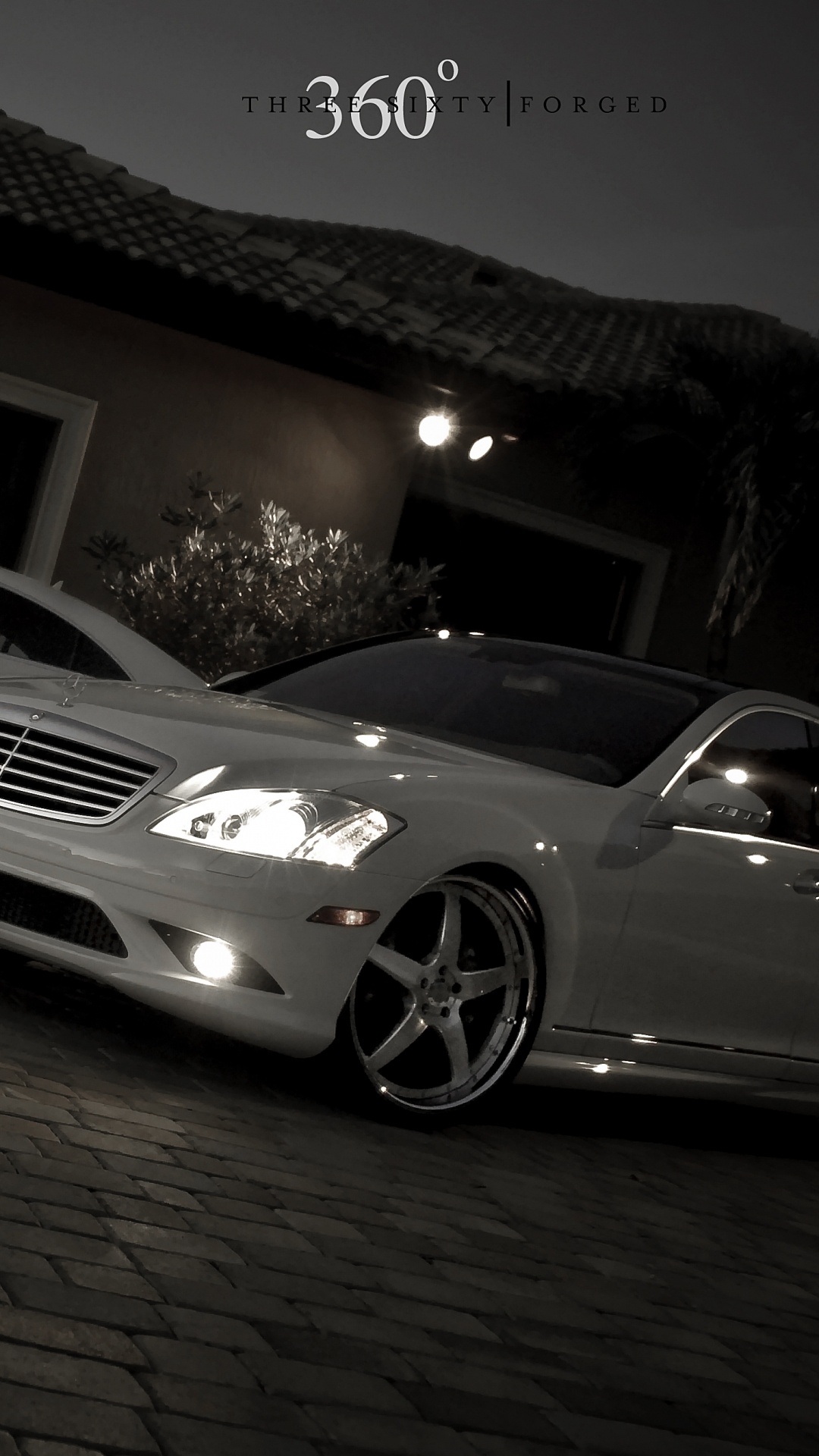 White Mercedes Benz Coupe Parked Near Brown Brick Wall. Wallpaper in 1080x1920 Resolution