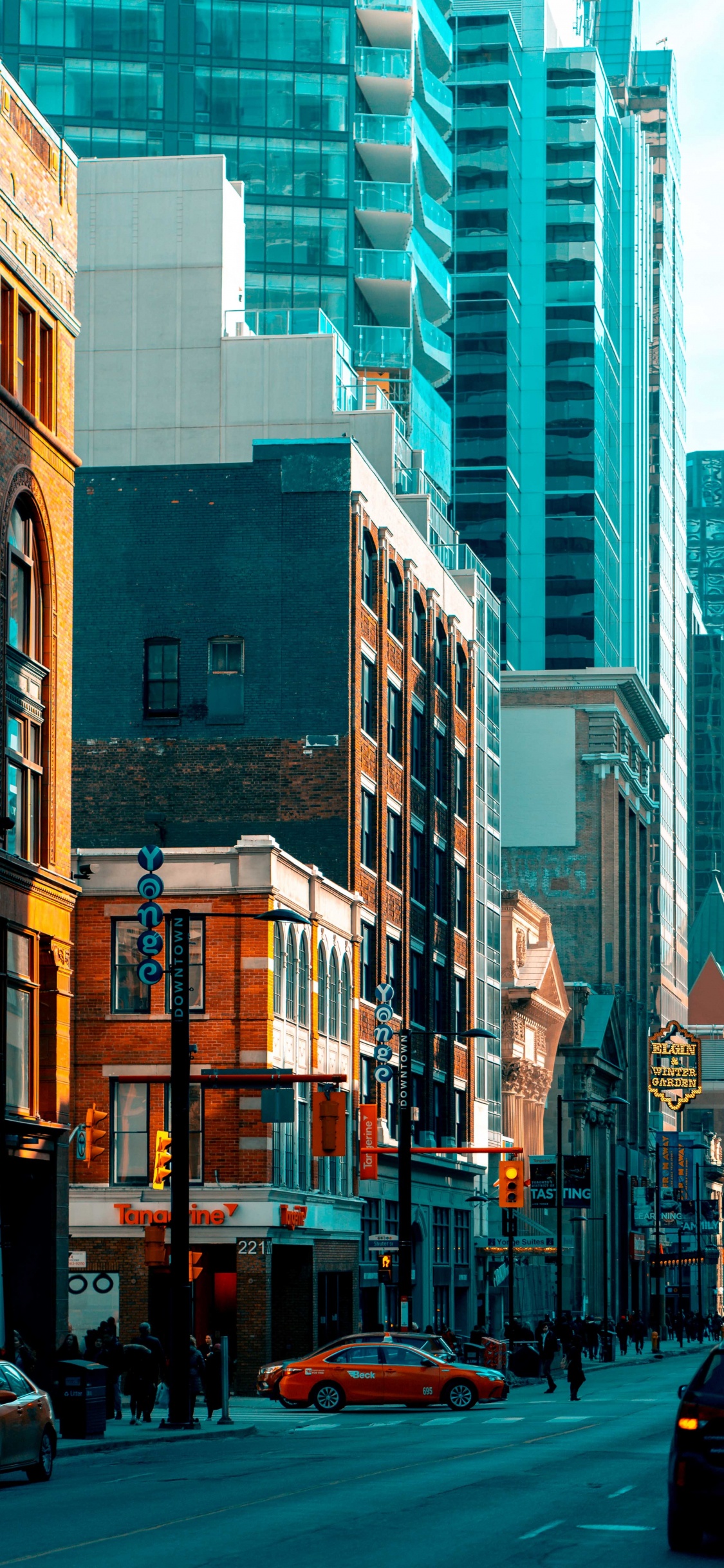 Brown and White Concrete Buildings During Daytime. Wallpaper in 1125x2436 Resolution