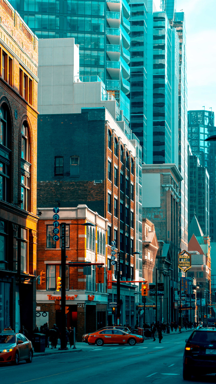 Brown and White Concrete Buildings During Daytime. Wallpaper in 750x1334 Resolution