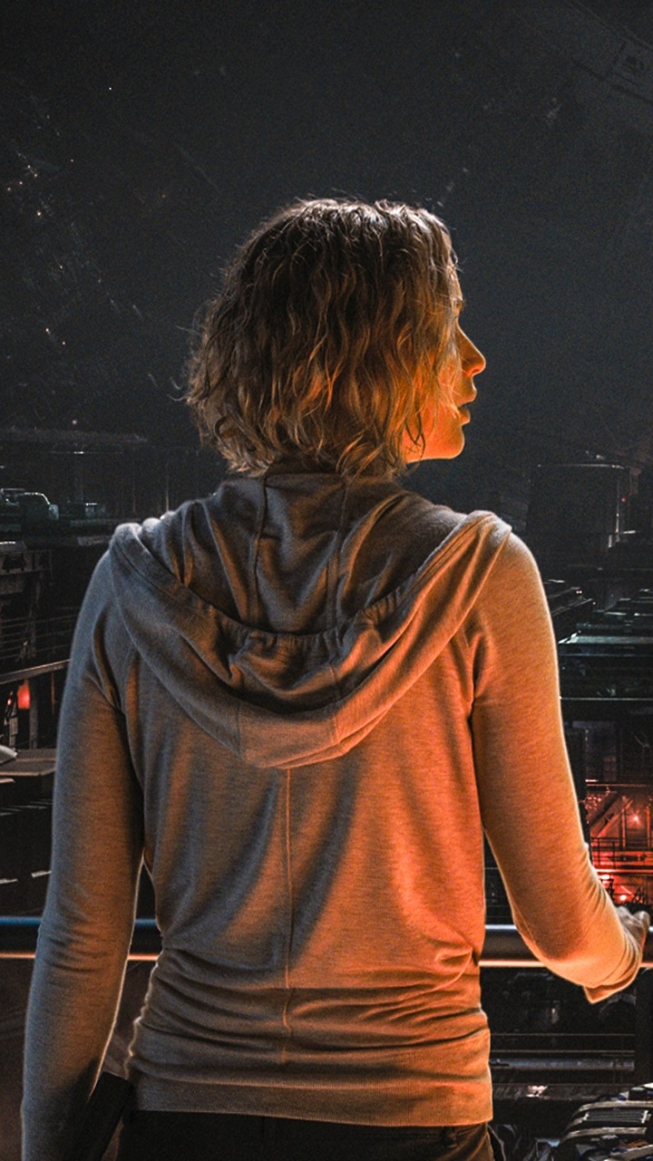 Homme en Chemise Grise à Manches Longues Debout à Côté D'une Femme en Robe Orange. Wallpaper in 720x1280 Resolution