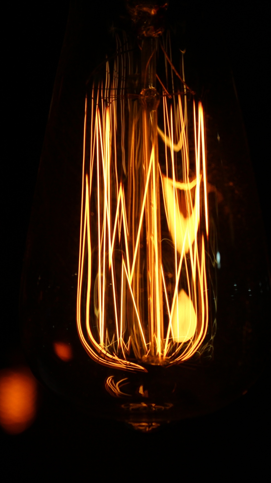 Clear Glass Light Bulb With Light. Wallpaper in 1080x1920 Resolution