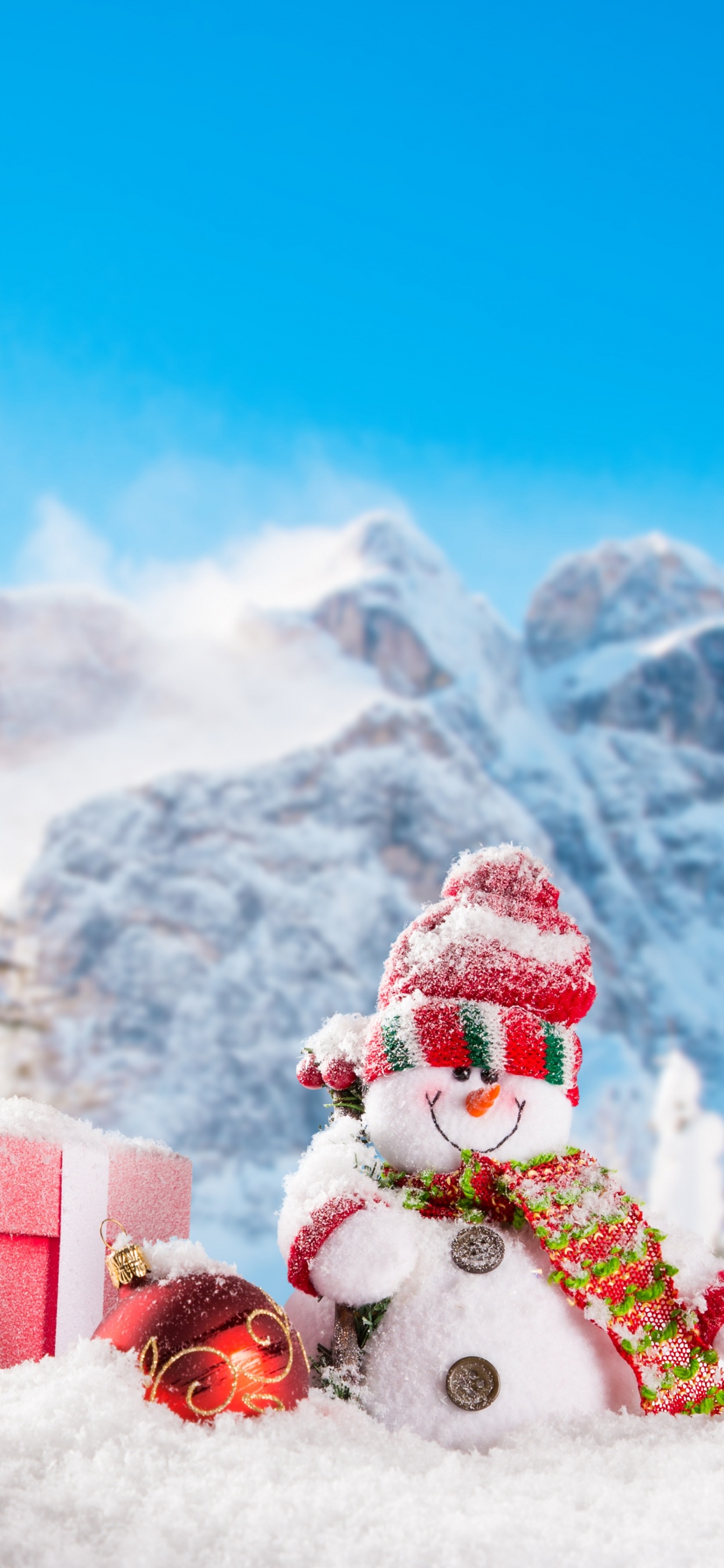 Père Noël Rouge et Blanc Sur Sol Couvert de Neige Pendant la Journée. Wallpaper in 1242x2688 Resolution