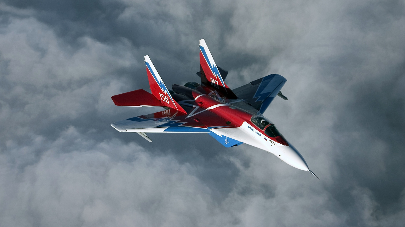 Red and White Jet Plane in Mid Air. Wallpaper in 1366x768 Resolution