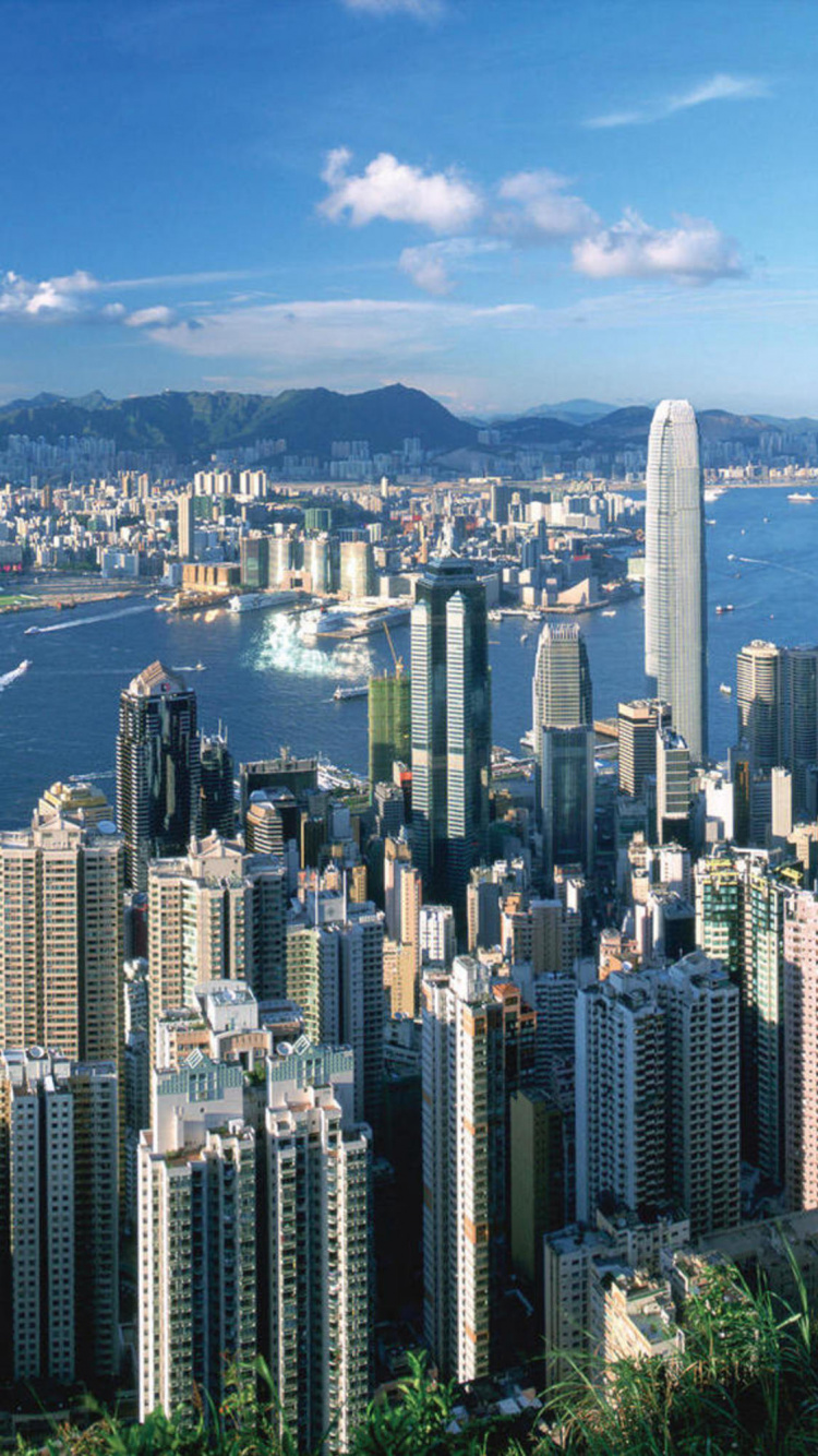 Horizon de la Ville Sous le Ciel Bleu Pendant la Journée. Wallpaper in 750x1334 Resolution