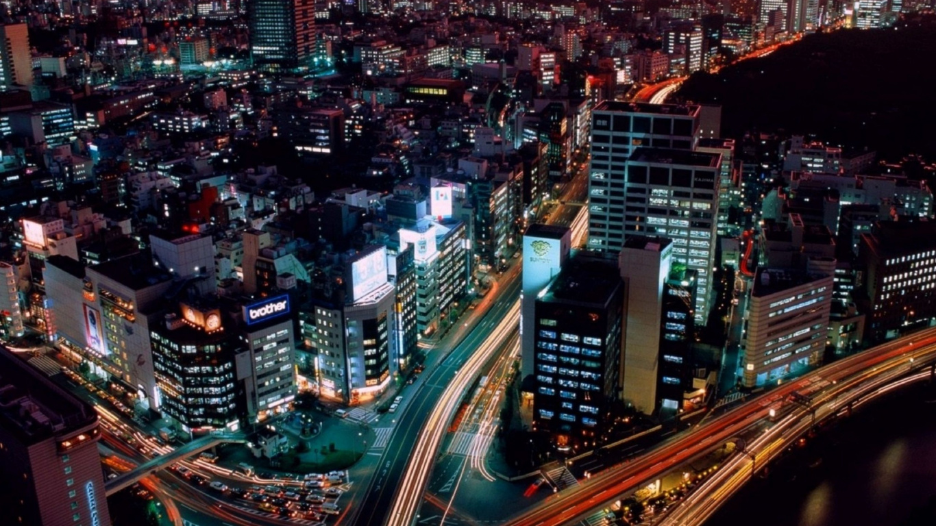 City With High Rise Buildings During Night Time. Wallpaper in 1366x768 Resolution