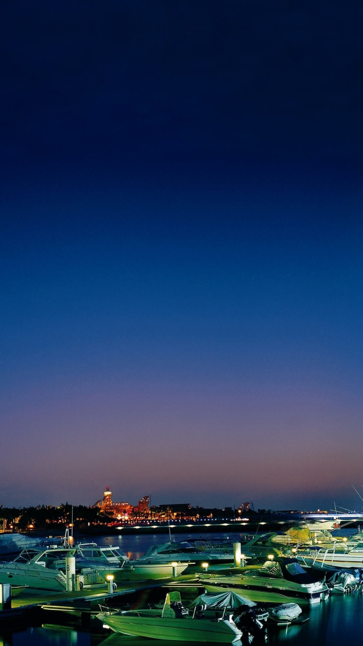 Green and White Boat on Sea During Night Time. Wallpaper in 720x1280 Resolution