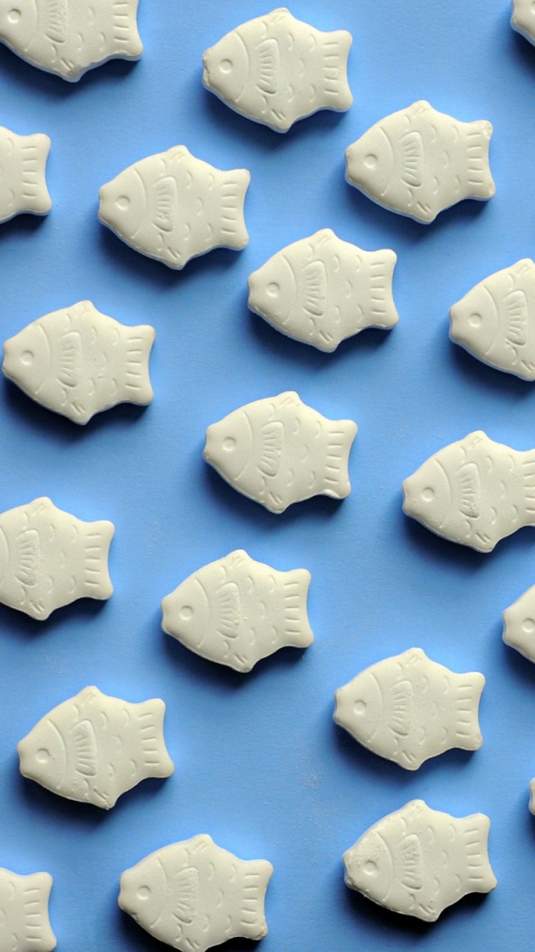 White Ice Cubes on Blue Textile. Wallpaper in 750x1334 Resolution