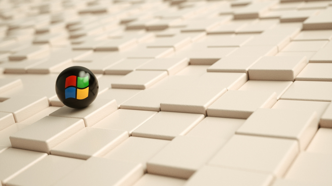 Bola Negra y Verde Sobre Bloques de Hormigón Blanco y Gris. Wallpaper in 1366x768 Resolution