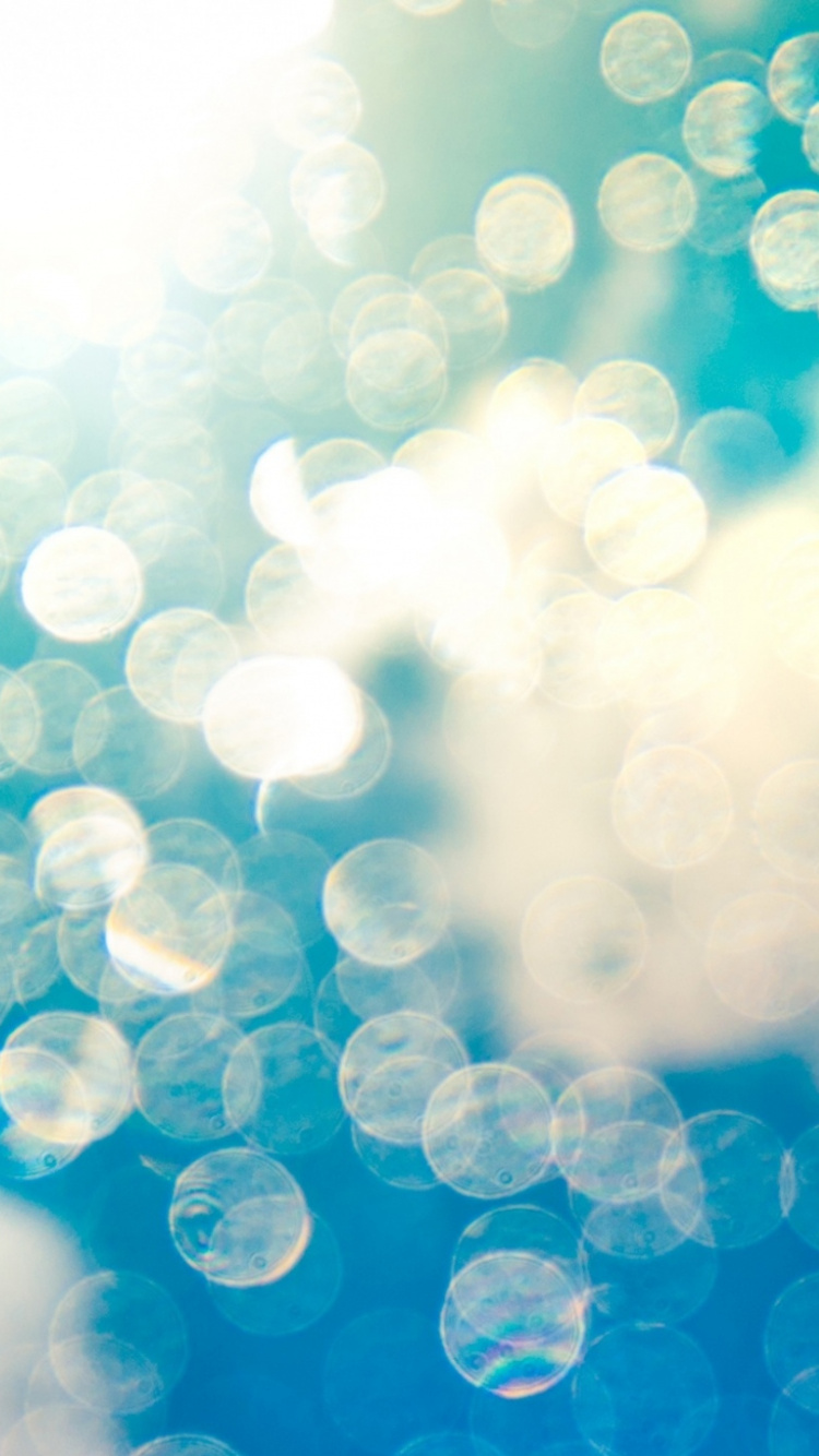 Blue and White Bokeh Lights. Wallpaper in 750x1334 Resolution