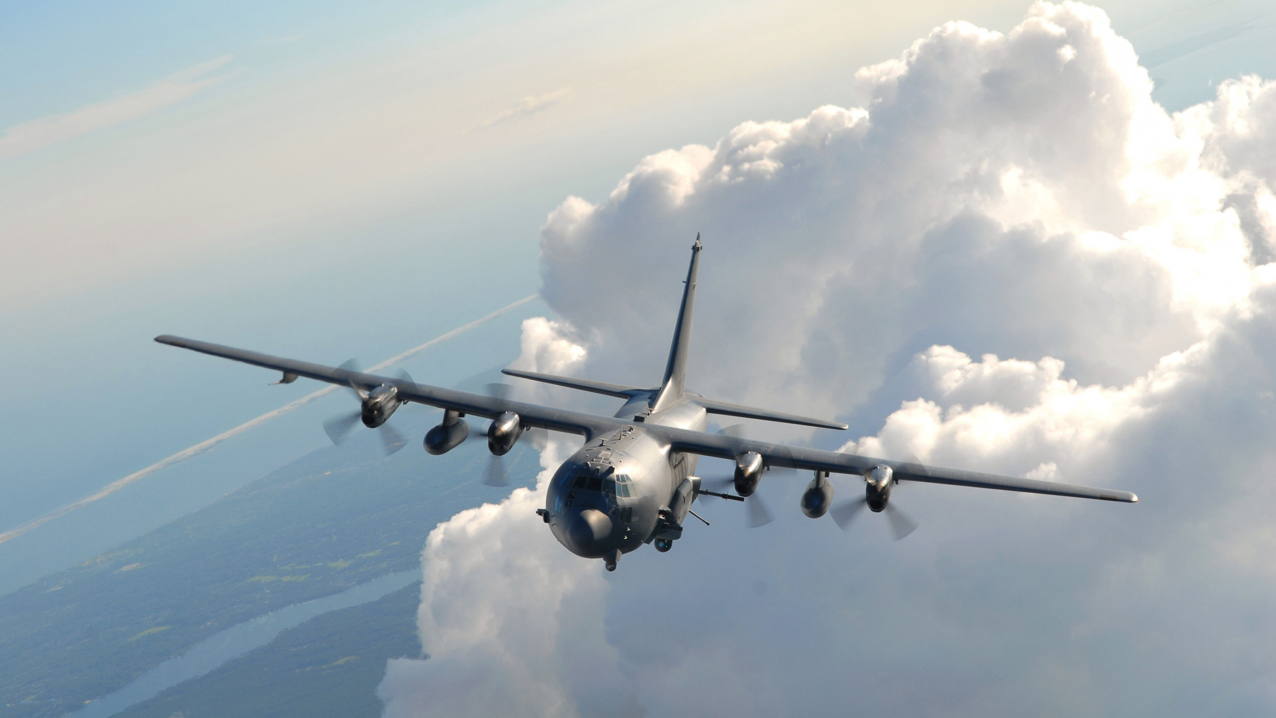 Gray Airplane Flying Over White Clouds During Daytime. Wallpaper in 2560x1440 Resolution