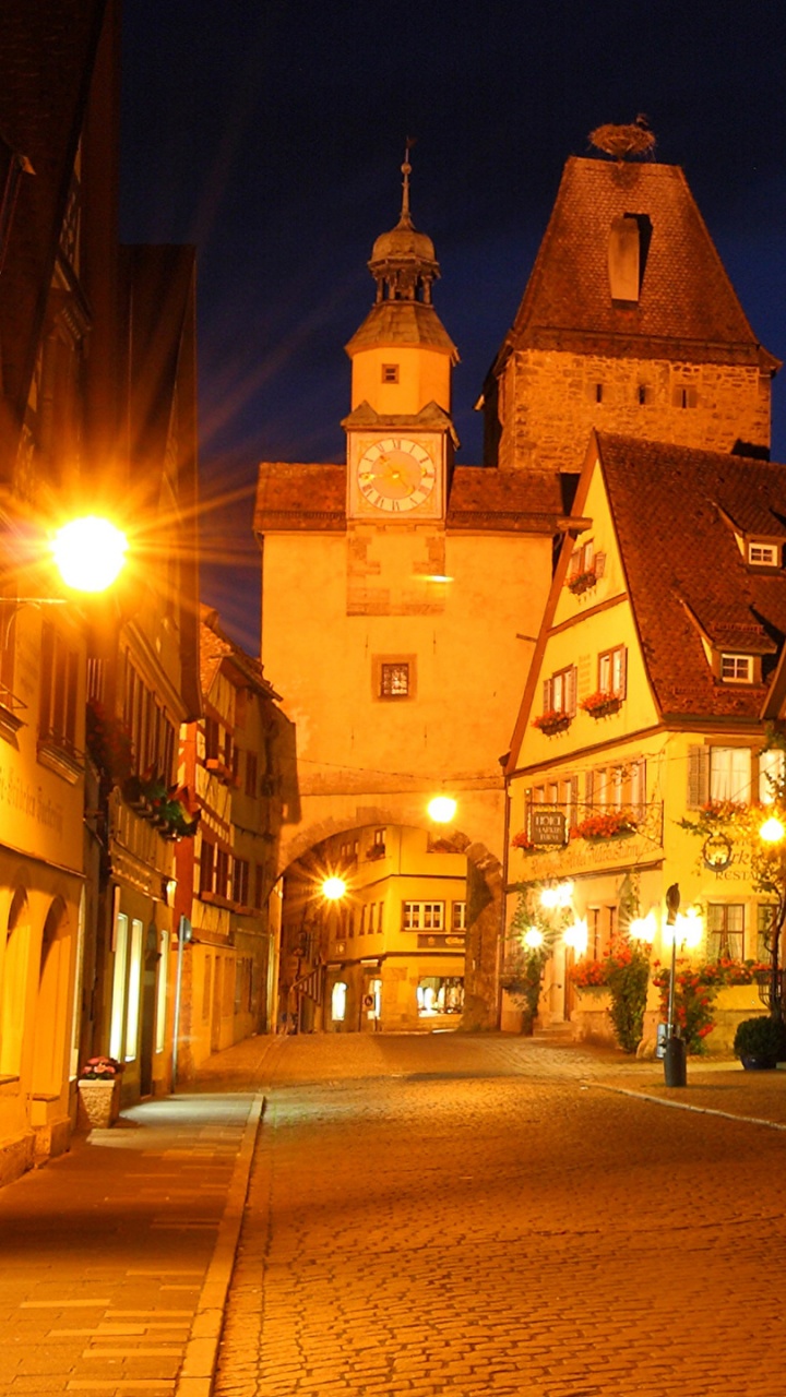Brown Concrete Building During Night Time. Wallpaper in 720x1280 Resolution