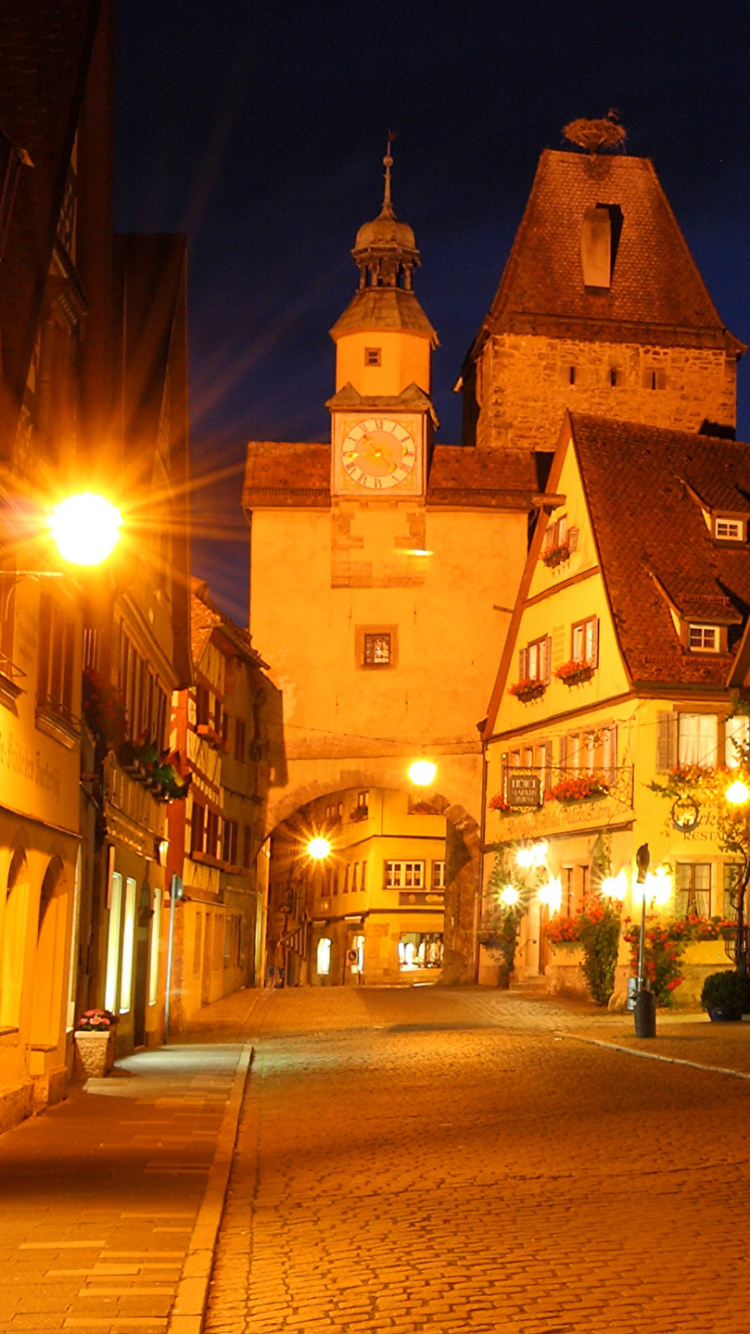 Bâtiment en Béton Brun Pendant la Nuit. Wallpaper in 750x1334 Resolution