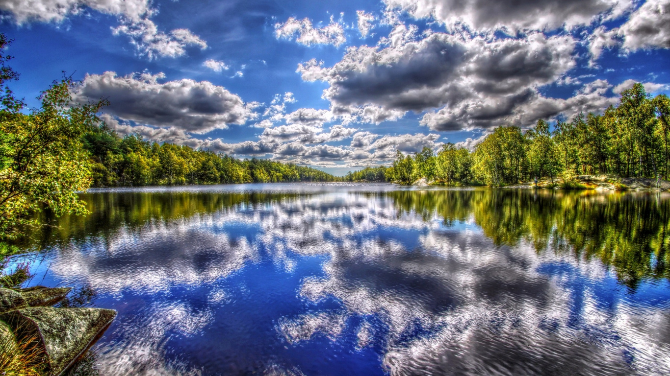 Green Trees Beside Body of Water Under Blue Sky and White Clouds During Daytime. Wallpaper in 1366x768 Resolution
