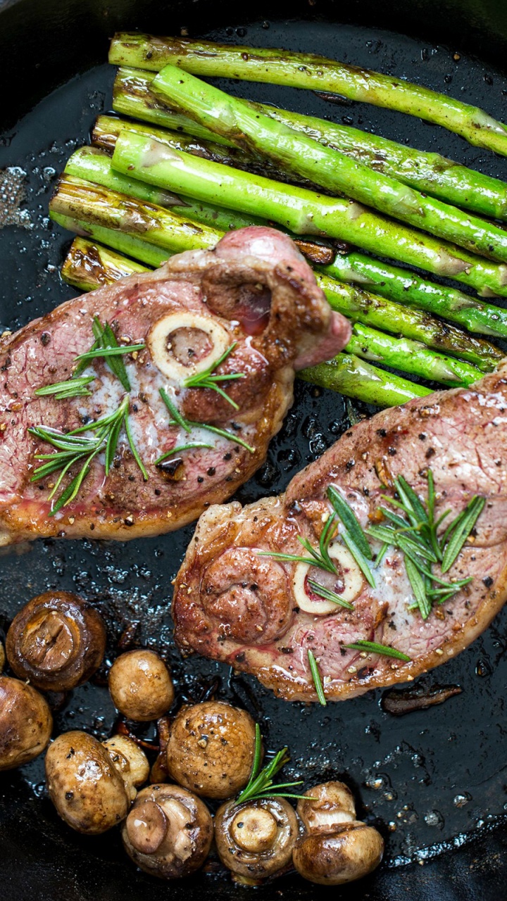 Cooked Food on Black Round Plate. Wallpaper in 720x1280 Resolution