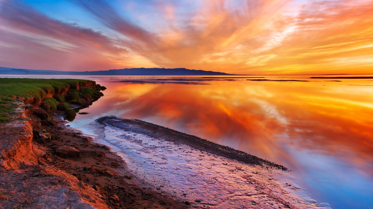 Body of Water Near Trees During Sunset. Wallpaper in 1280x720 Resolution