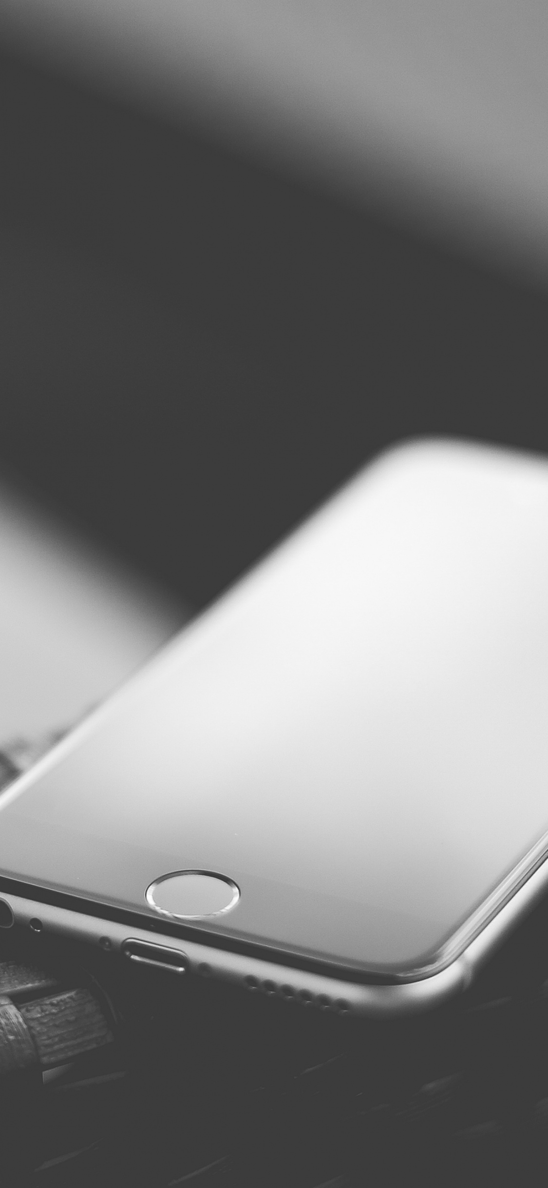 White Iphone 5 c on White Textile. Wallpaper in 1125x2436 Resolution