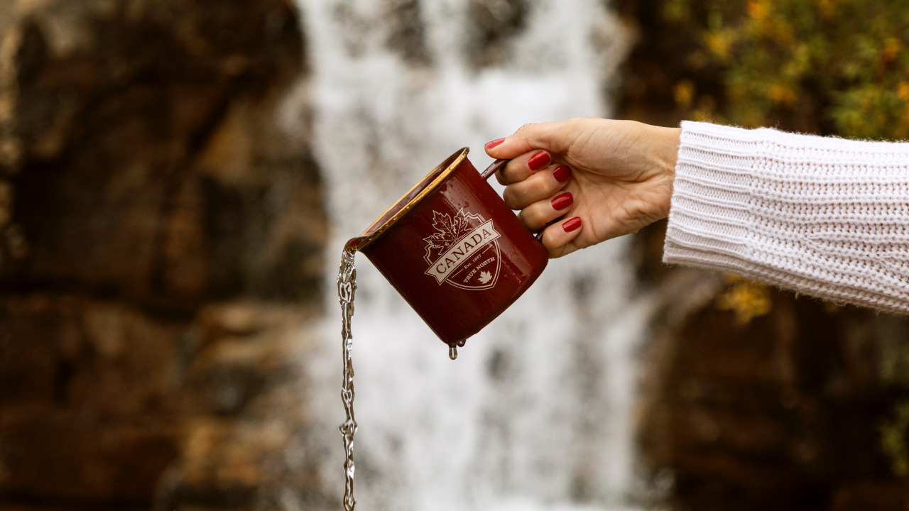 Person Holding Red and White Book. Wallpaper in 1280x720 Resolution