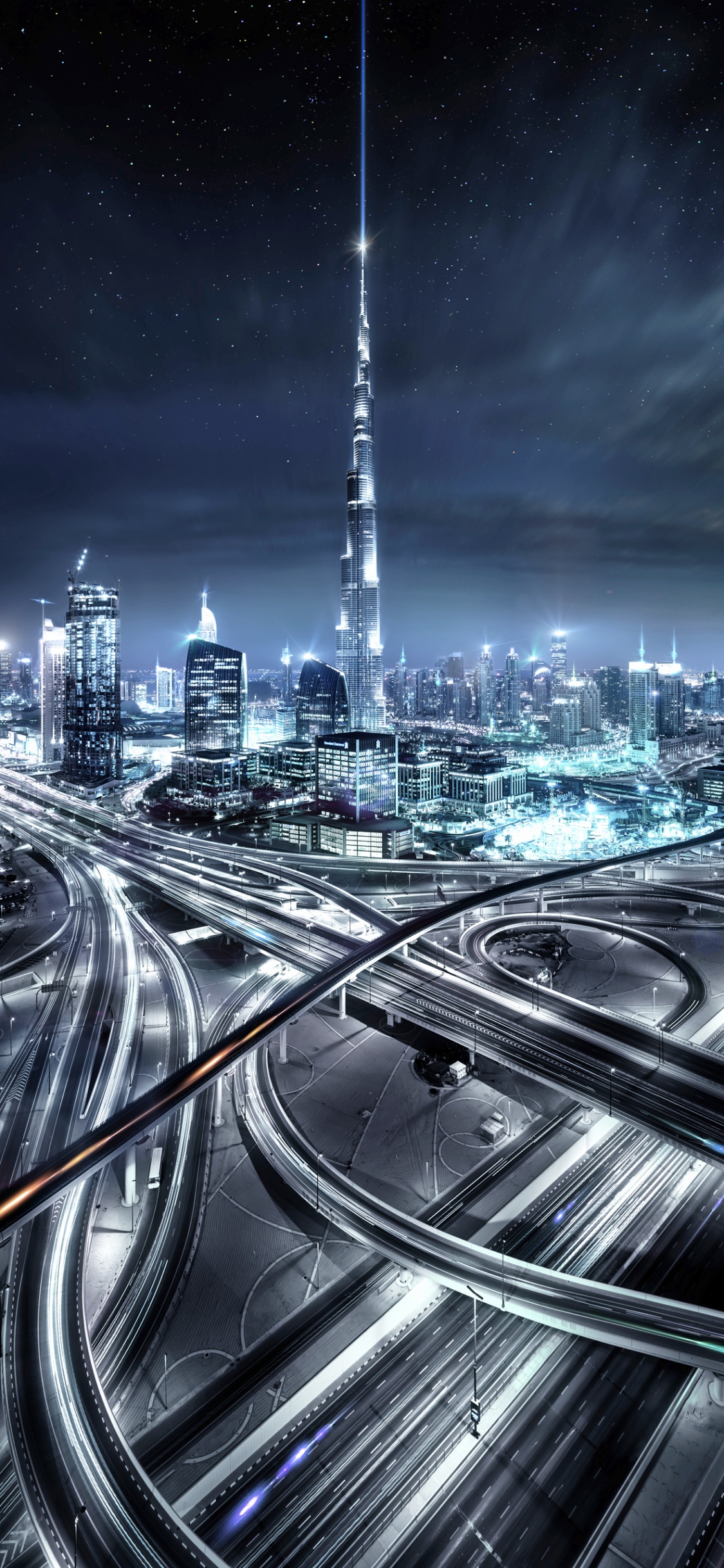 City Buildings During Night Time. Wallpaper in 1125x2436 Resolution