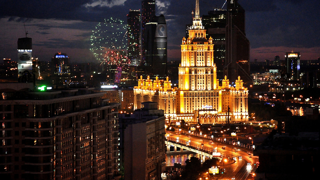 City Buildings With Lights Turned on During Night Time. Wallpaper in 1280x720 Resolution