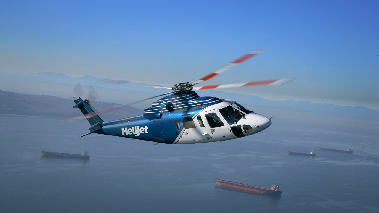 Avión Azul y Blanco en el Aire Durante el Día. Wallpaper in 1280x720 Resolution