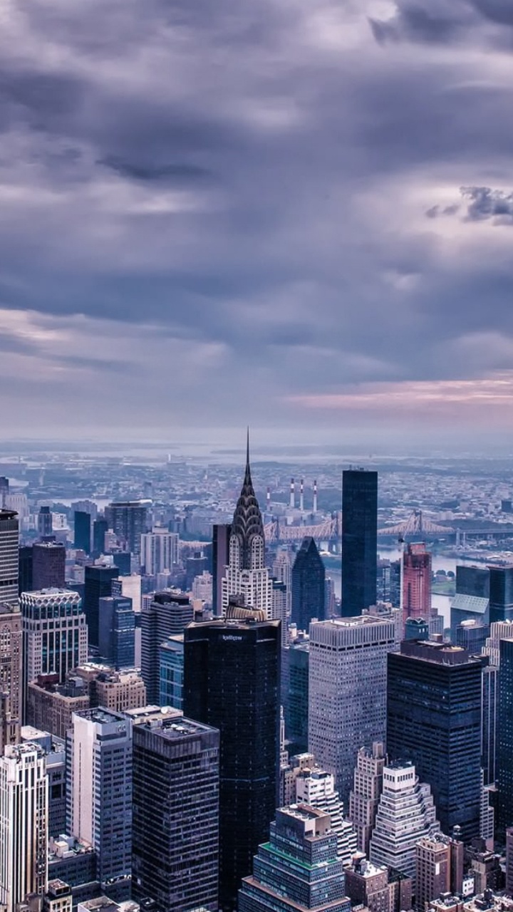 Horizon de la Ville Sous un Ciel Nuageux Pendant la Journée. Wallpaper in 720x1280 Resolution