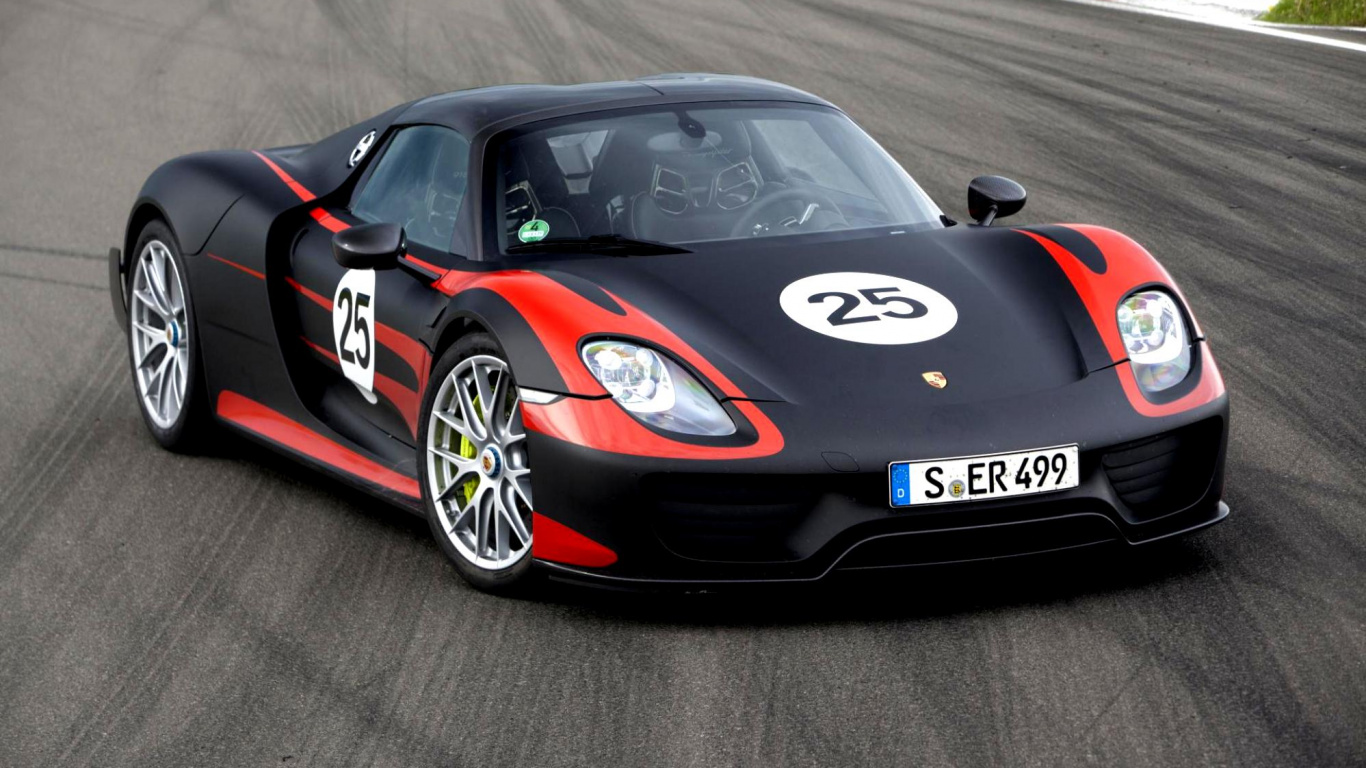 Coche Deportivo Ferrari Negro y Rojo en la Carretera. Wallpaper in 1366x768 Resolution