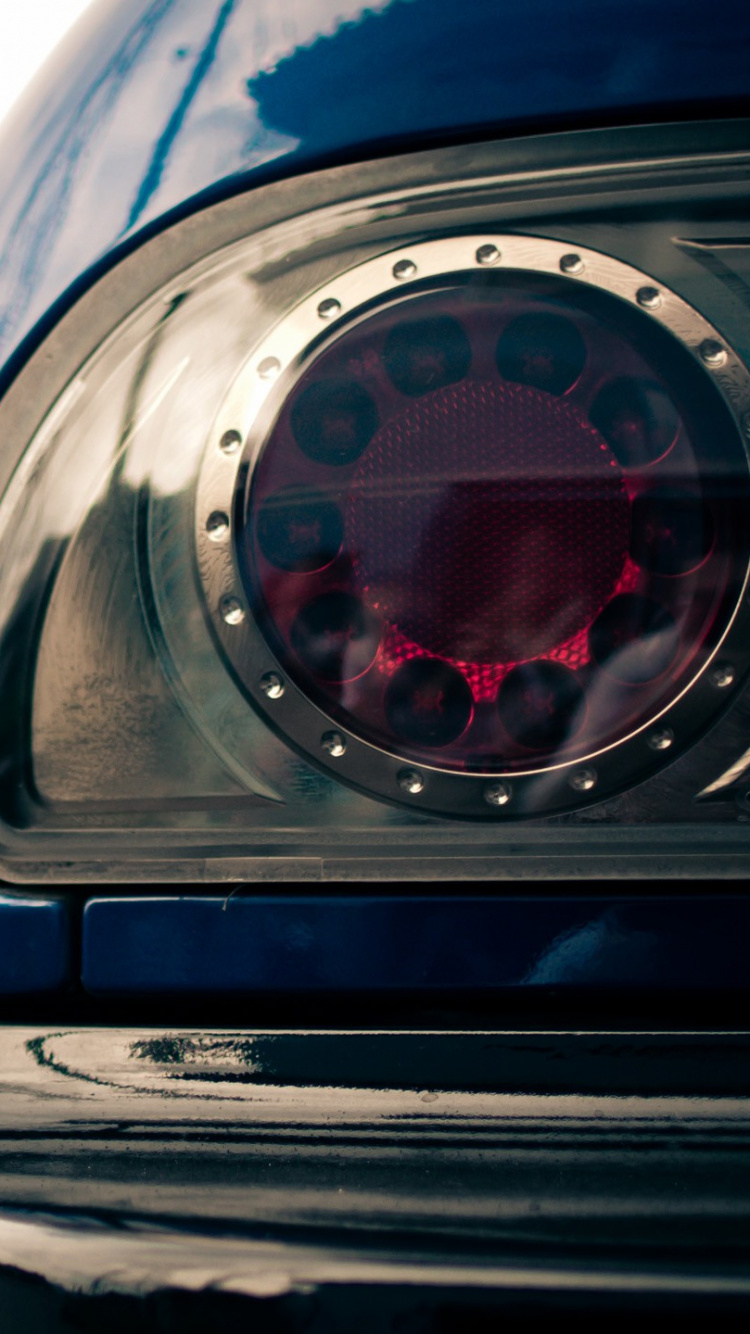 Blue and Silver Car in Close up Photography. Wallpaper in 750x1334 Resolution