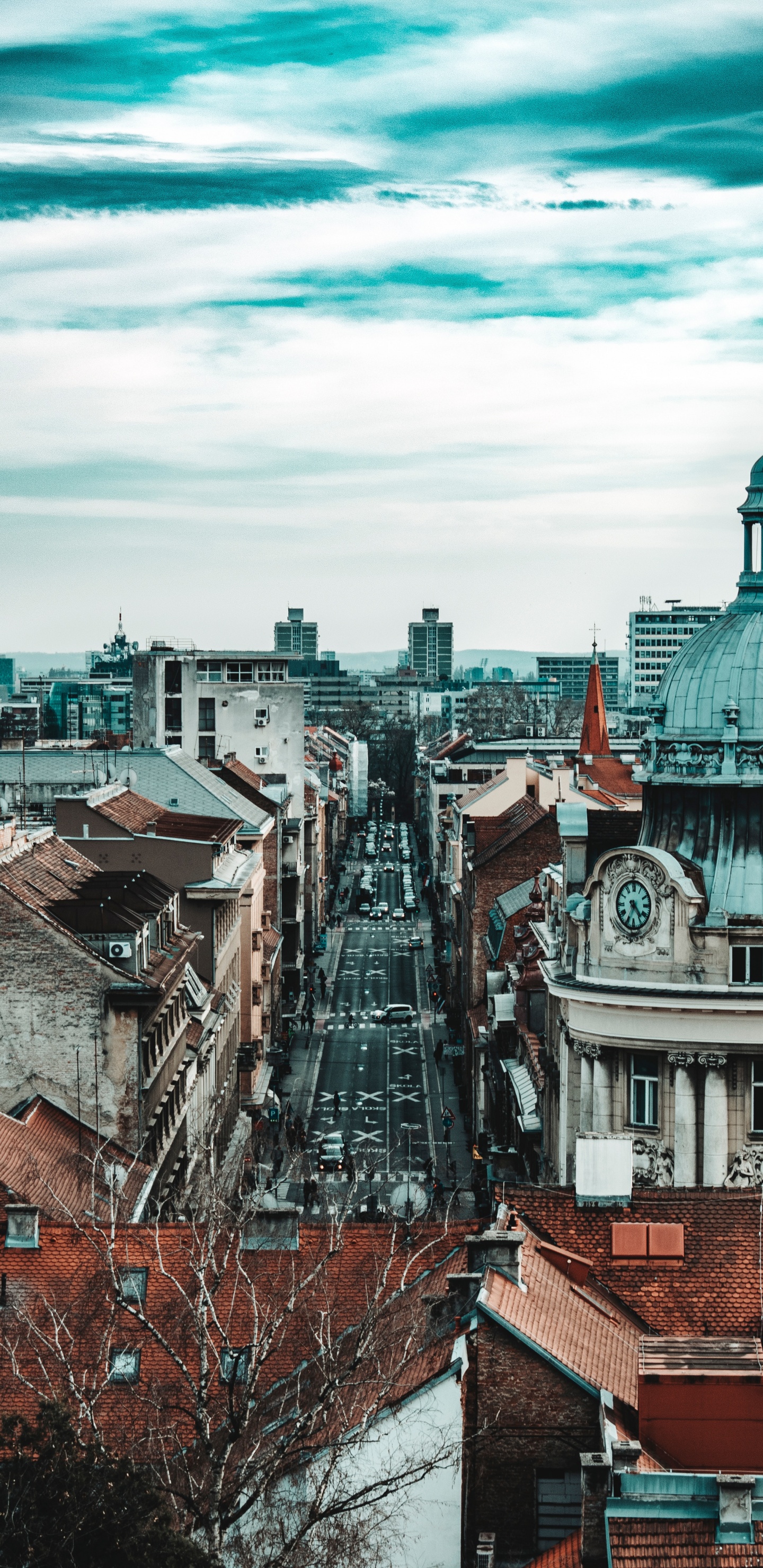 Brown and White Concrete Buildings Under White Clouds and Blue Sky During Daytime. Wallpaper in 1440x2960 Resolution