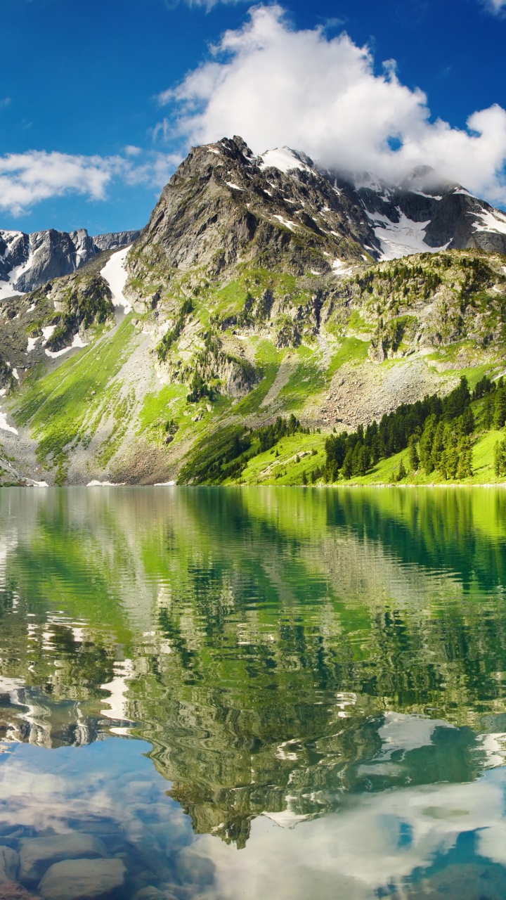 Green and White Mountains Near Lake Under Blue Sky During Daytime. Wallpaper in 720x1280 Resolution