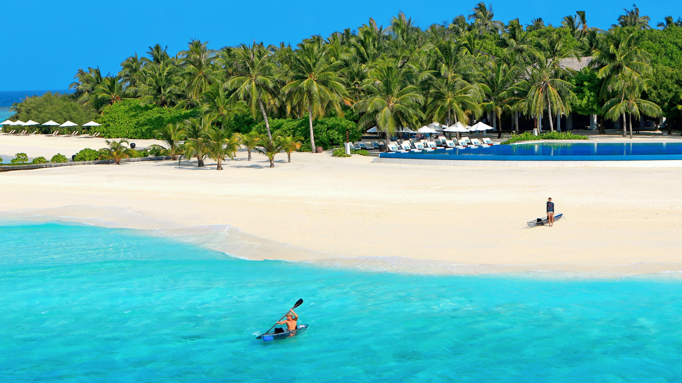 Woman in Blue Swimsuit Swimming on Blue Sea During Daytime. Wallpaper in 1366x768 Resolution