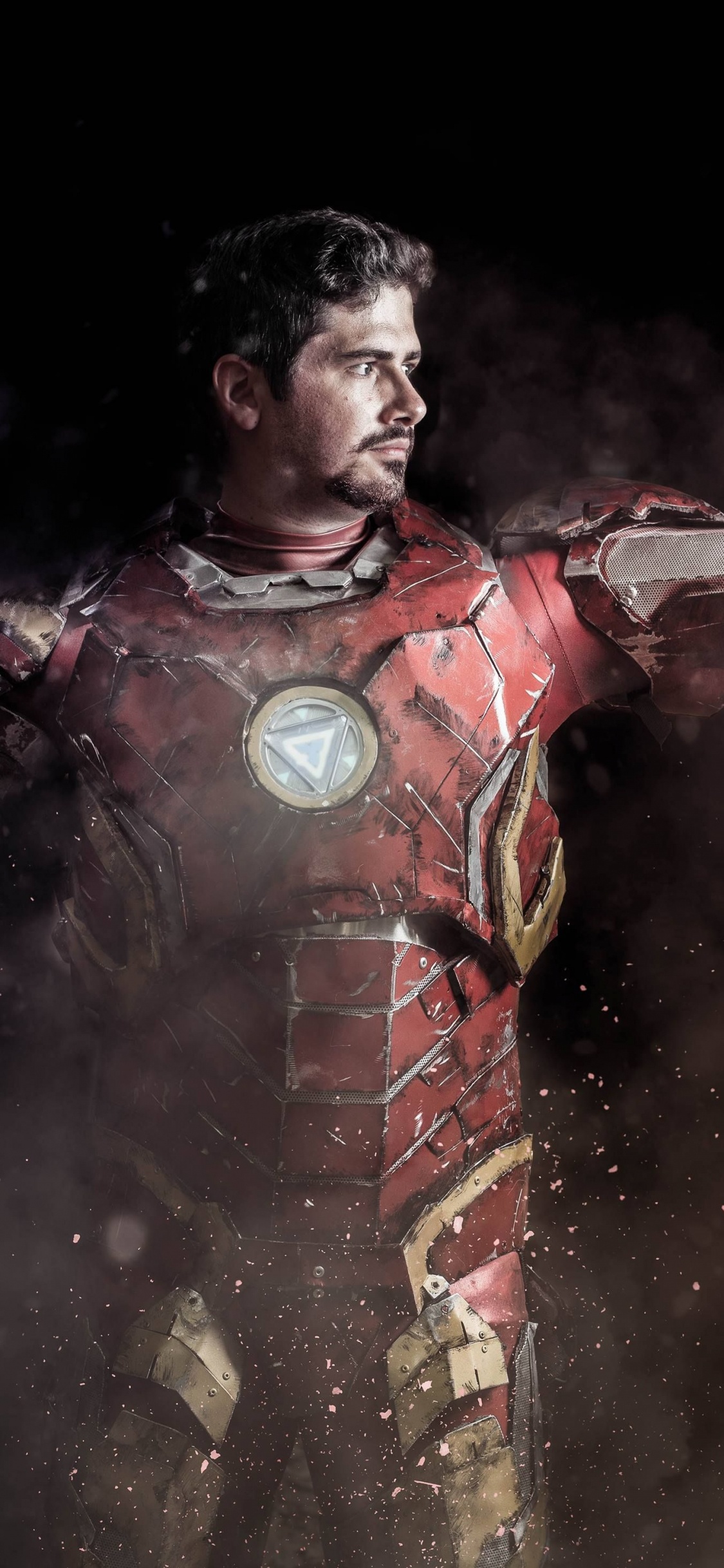 Man in Red and Black Suit. Wallpaper in 1125x2436 Resolution