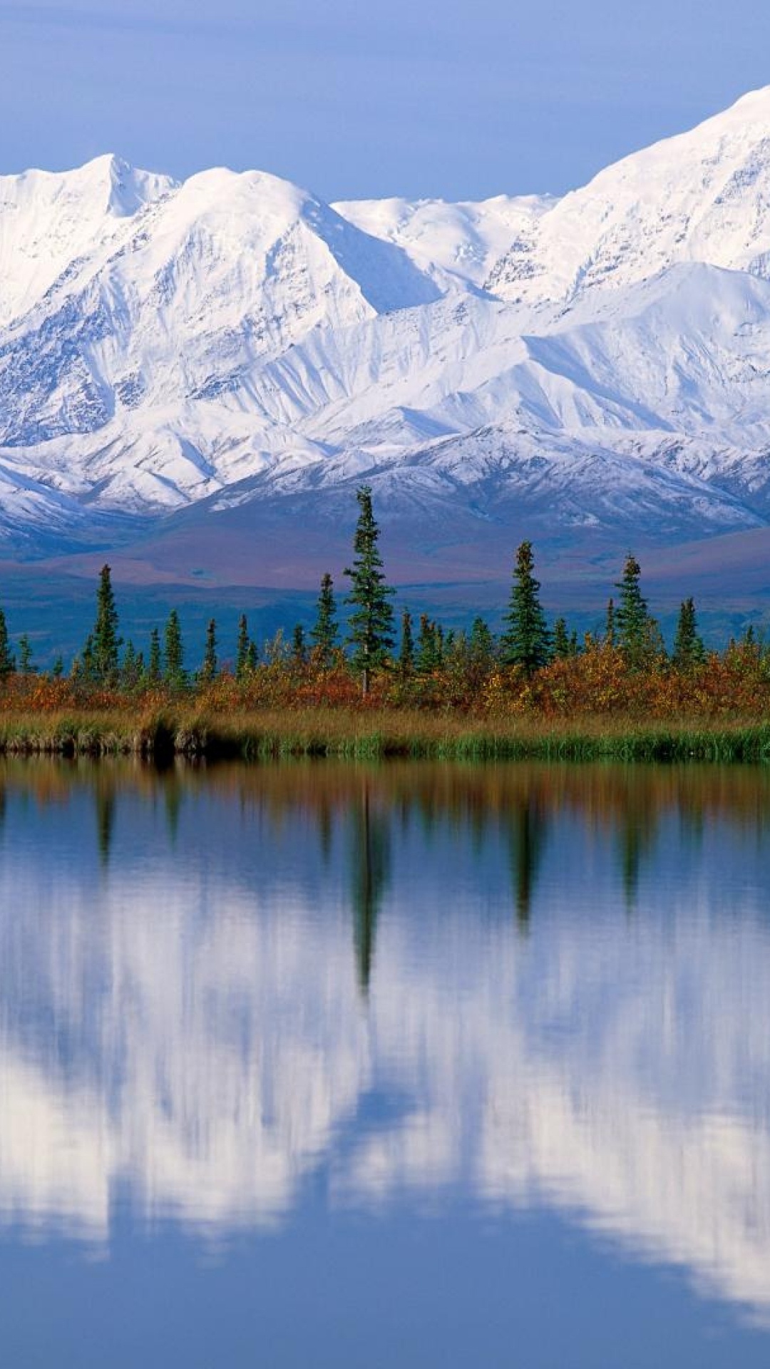 Lake Near Trees and Snow Covered Mountain During Daytime. Wallpaper in 1080x1920 Resolution