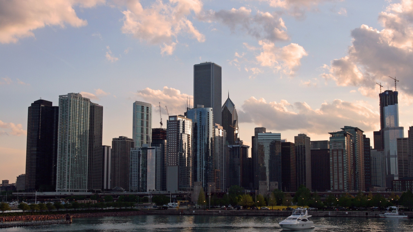 White Boat on Water Near City Buildings During Daytime. Wallpaper in 1366x768 Resolution