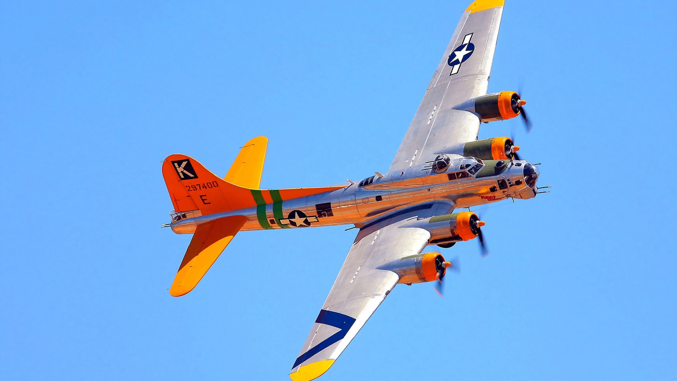 Orange-gelbes Düsenflugzeug in Der Luft Tagsüber. Wallpaper in 1366x768 Resolution