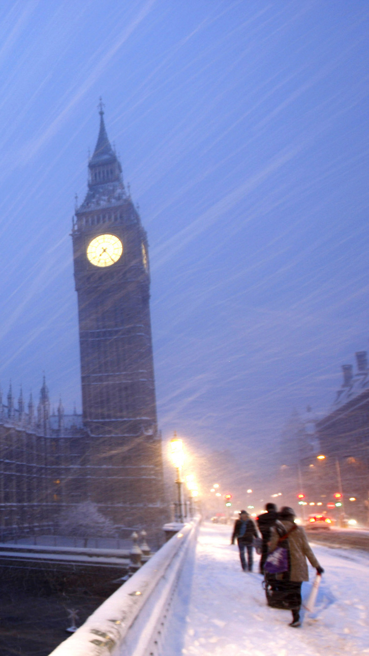 Brown Concrete Building During Night Time. Wallpaper in 750x1334 Resolution
