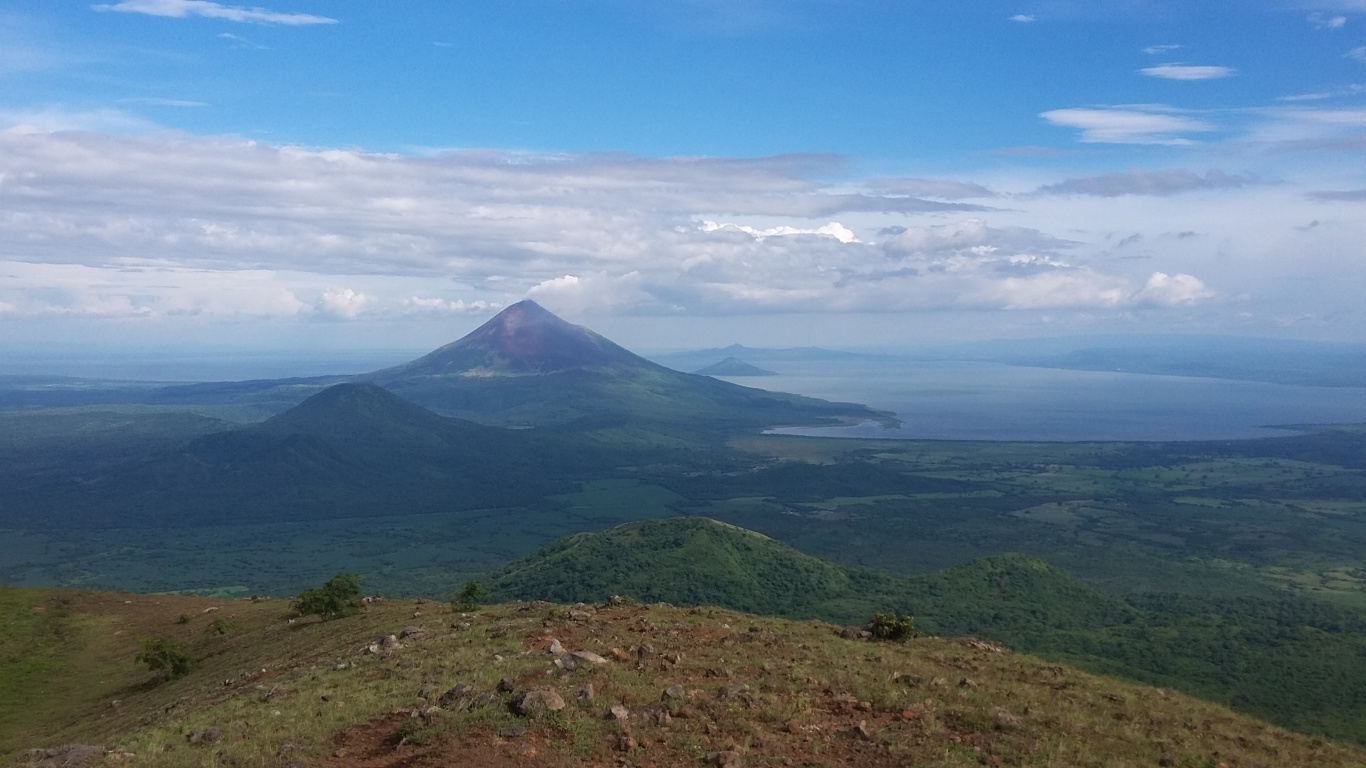 Green Mountain Under Blue Sky During Daytime. Wallpaper in 1366x768 Resolution